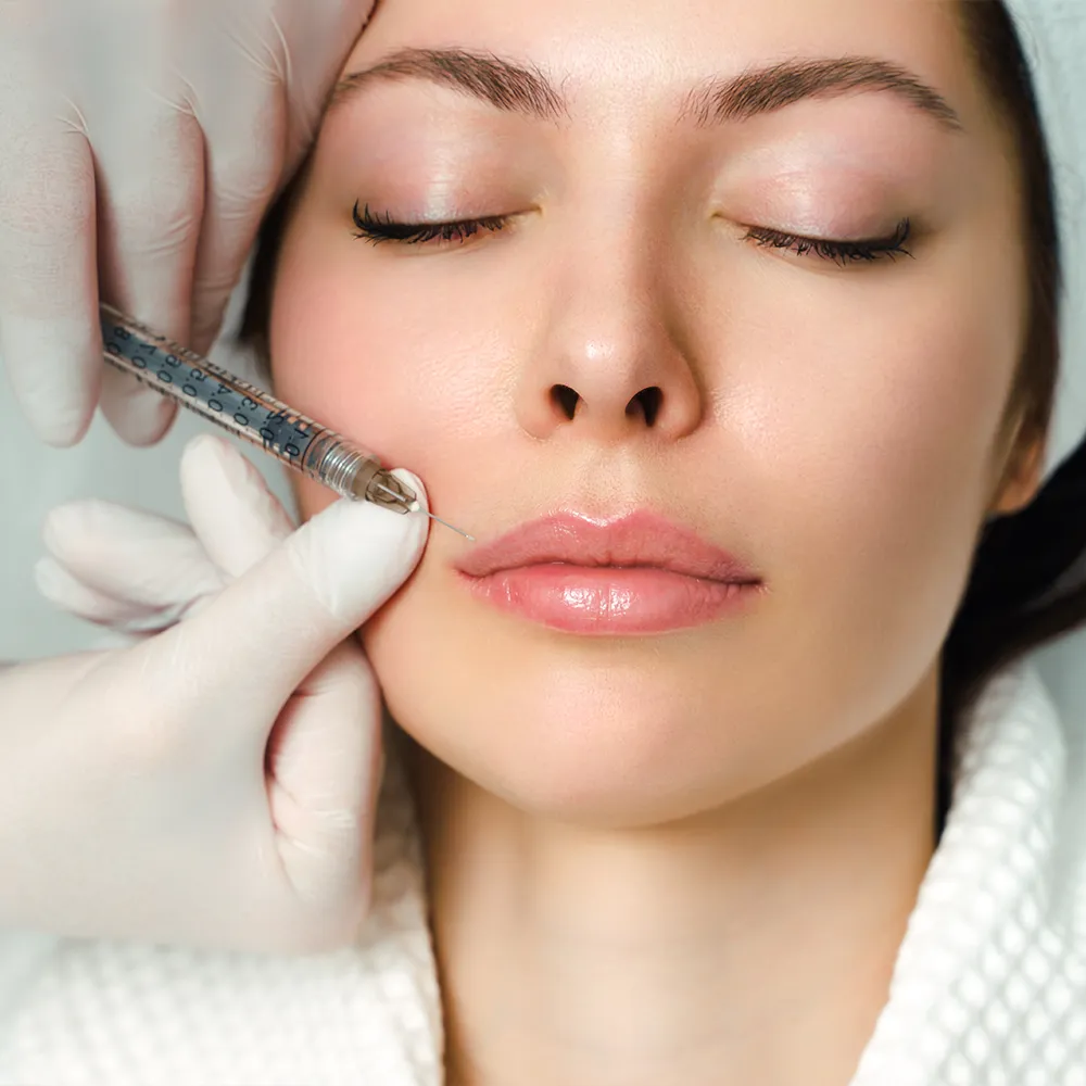 A woman receiving dermal filler injections.